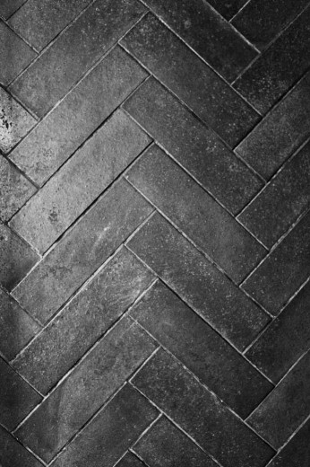 herringbone tile pattern with black brick upright cafe